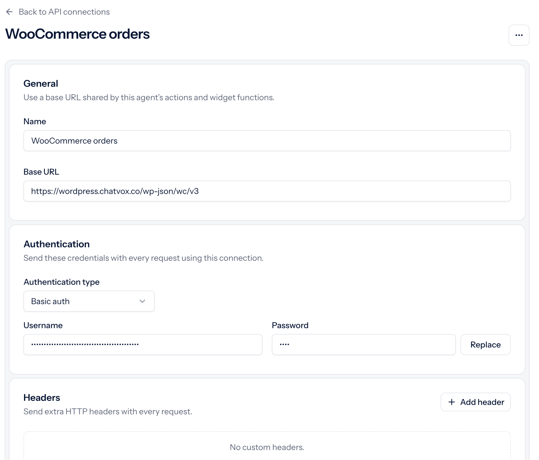 WooCommerce orders connection using the REST API base URL and Basic auth, with both credentials masked